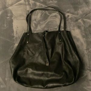 Tiffany Tote, black, well-loved, but still has life!  Reversible